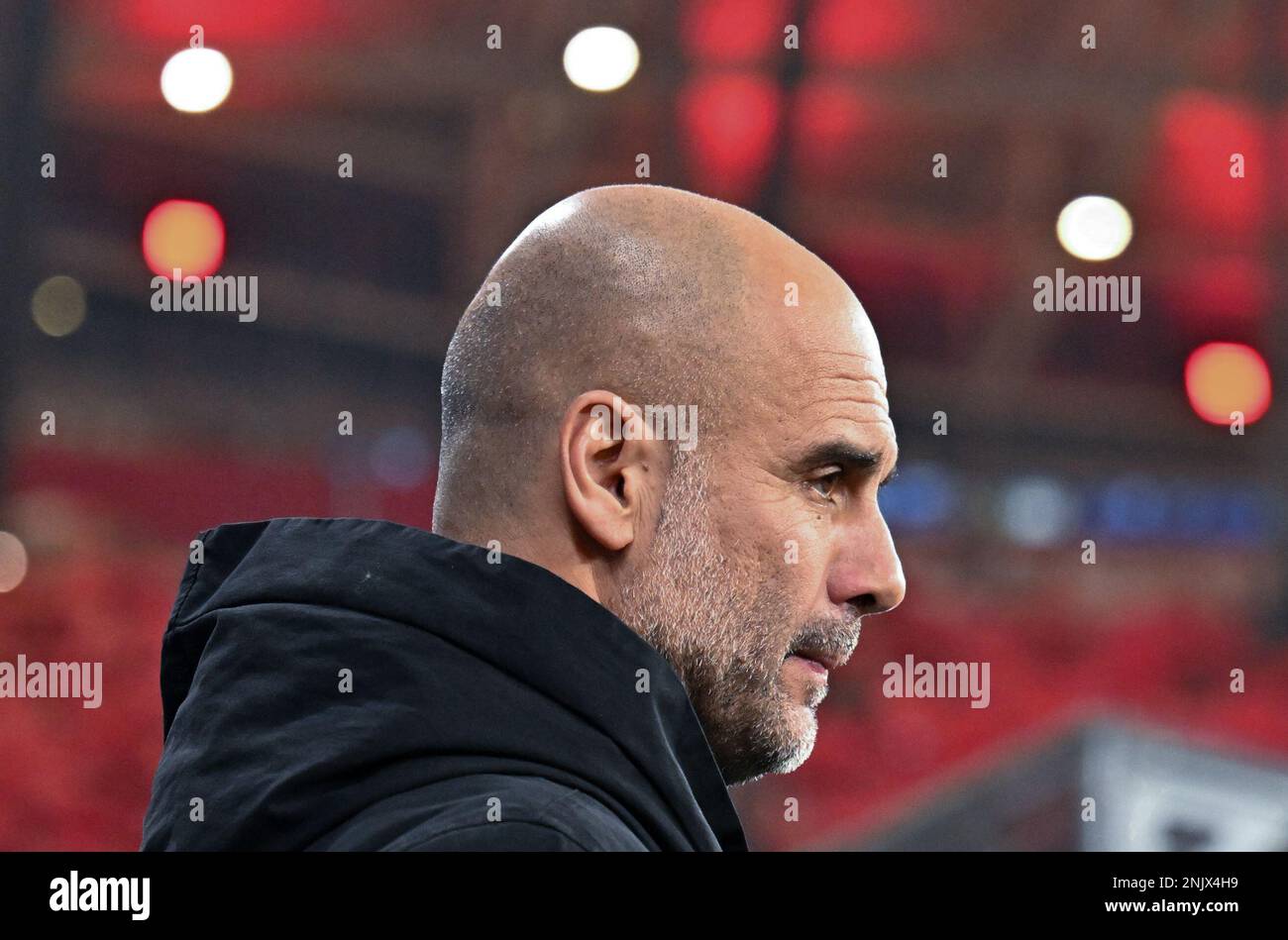 Leipzig, Germany. 22nd Feb, 2023. Soccer: Champions League, RB Leipzig - Manchester City, knockout round, round of 16, first leg at Red Bull Arena. Manchester's coach Pep Guardiola arrives at the stadium before the start of the match. Credit: Hendrik Schmidt/dpa/Alamy Live News Stock Photo