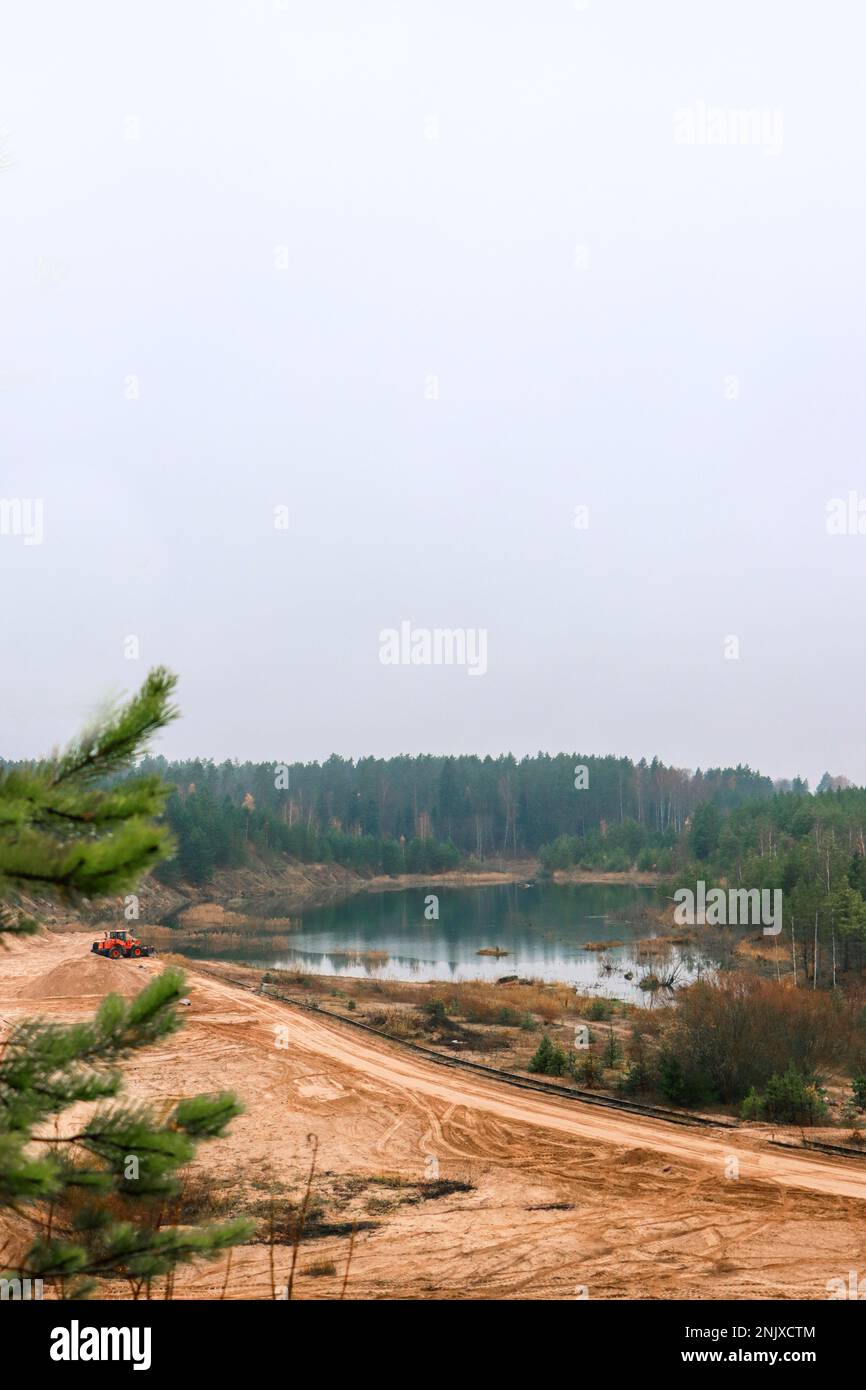 Lake in a forest, tranquil scenery for autumn fans Stock Photo