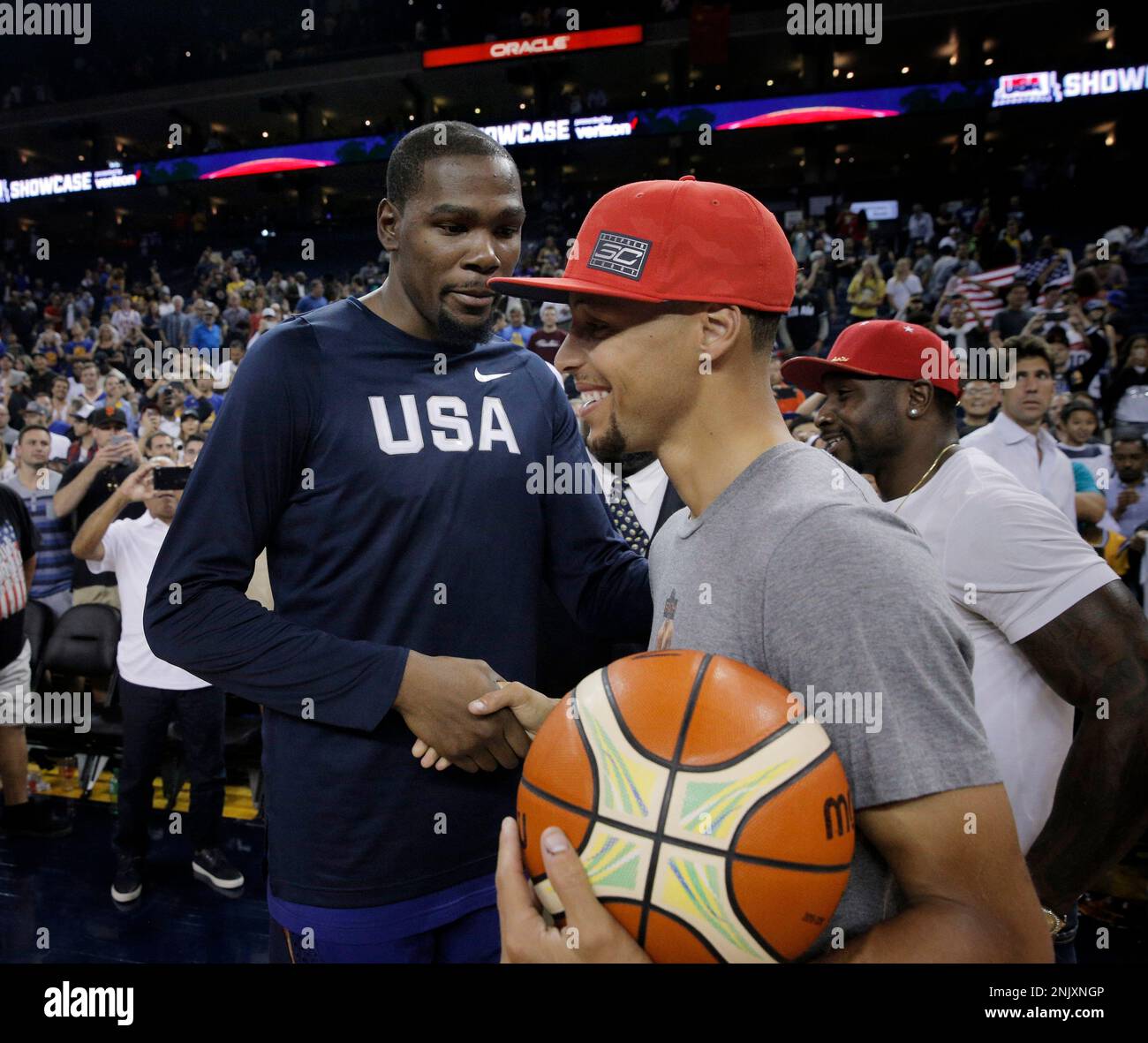 Kevin Durant shakes hand with Stephen Curry after the USA Mens