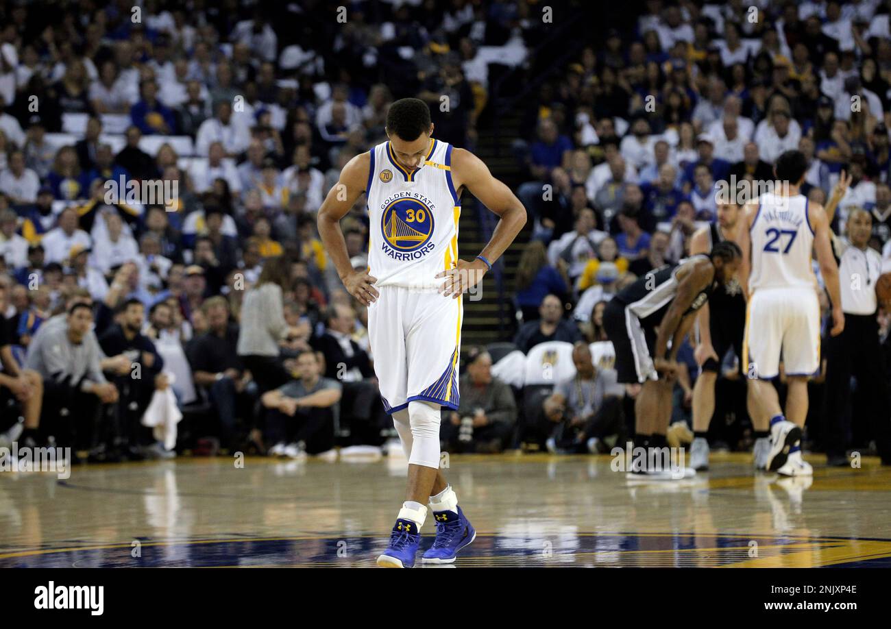 Stephen Curry (30) walks back to the bench after a call went against the  Warriors in the second half as the Golden State Warriors played the Boston  Celtics at Oracle Arena in