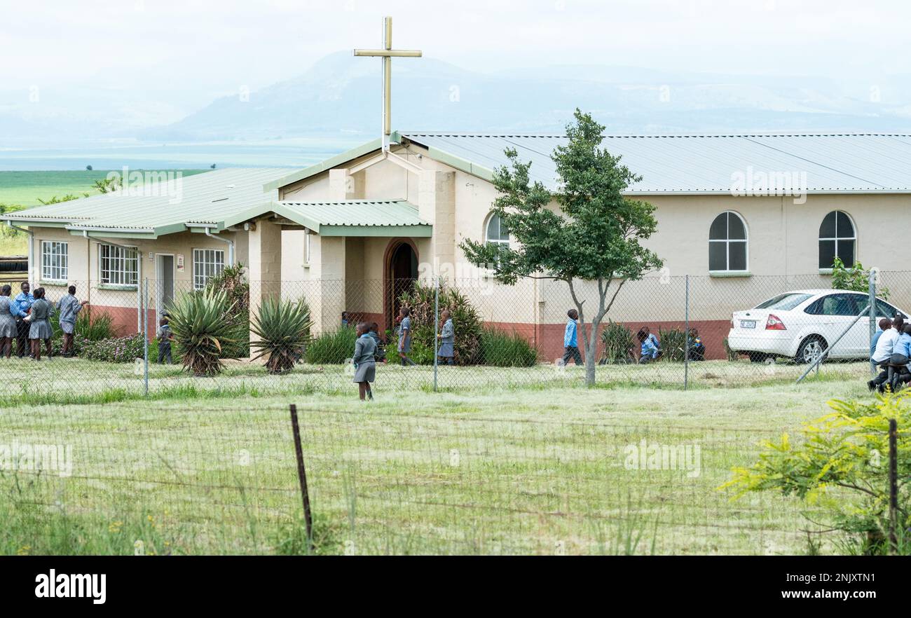 typical rural traditional christian primary or junior school building with  young children in Kwazulu Natal, South Africa concept education Stock Photo