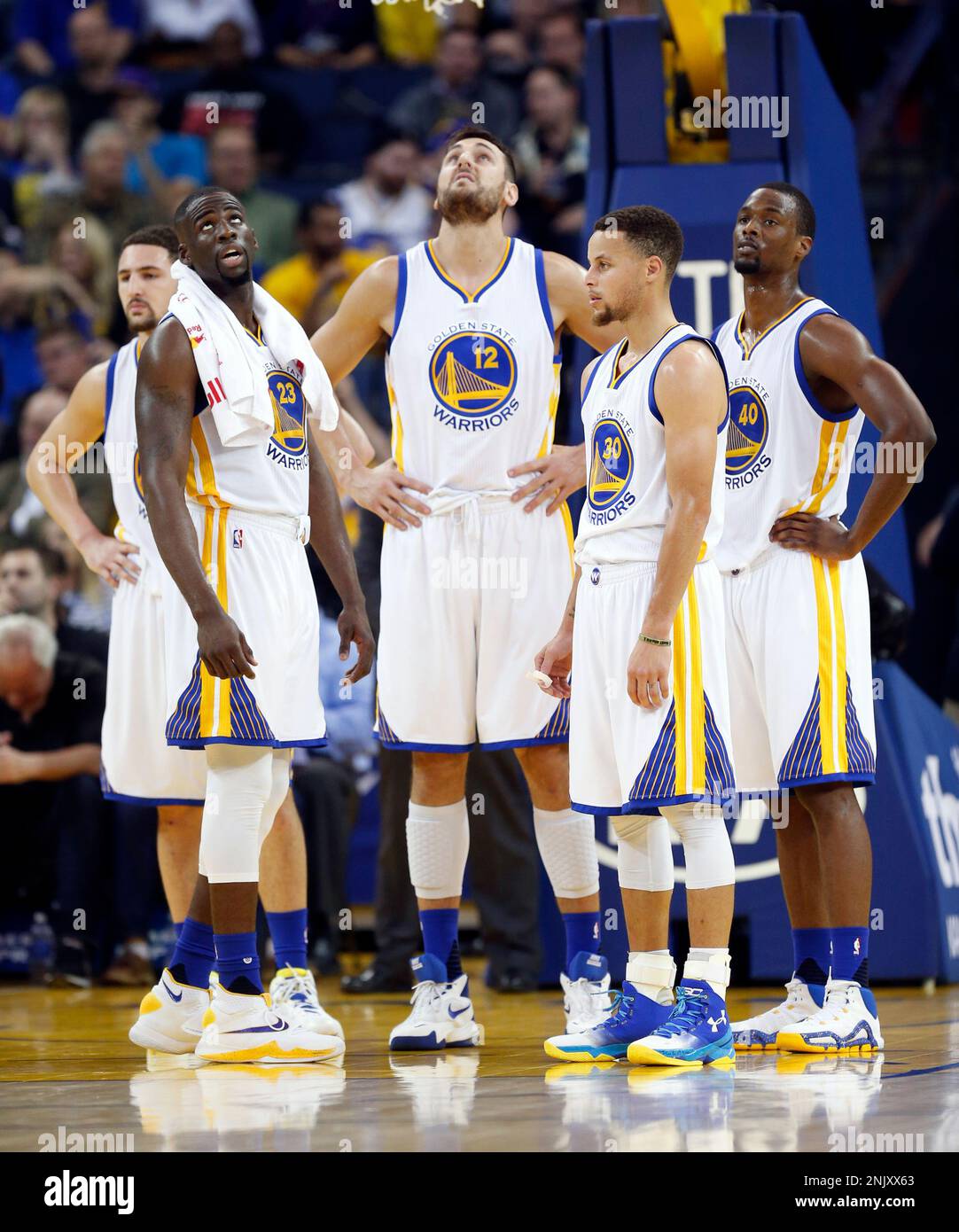 Golden State Warriors Klay Thompson, Draymond Green, Andrew Bogut, Stephen Curry and Harrison Barnes wait out a video replay during Warriors 115-94 win over Utah Jazz during NBA game at Oracle Arena