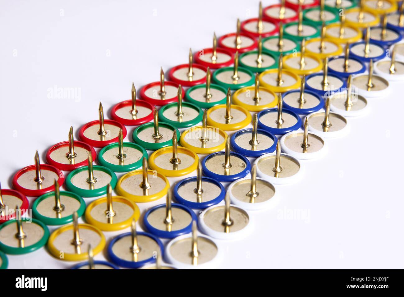 colourful tacks, in rows cutout Stock Photo Alamy