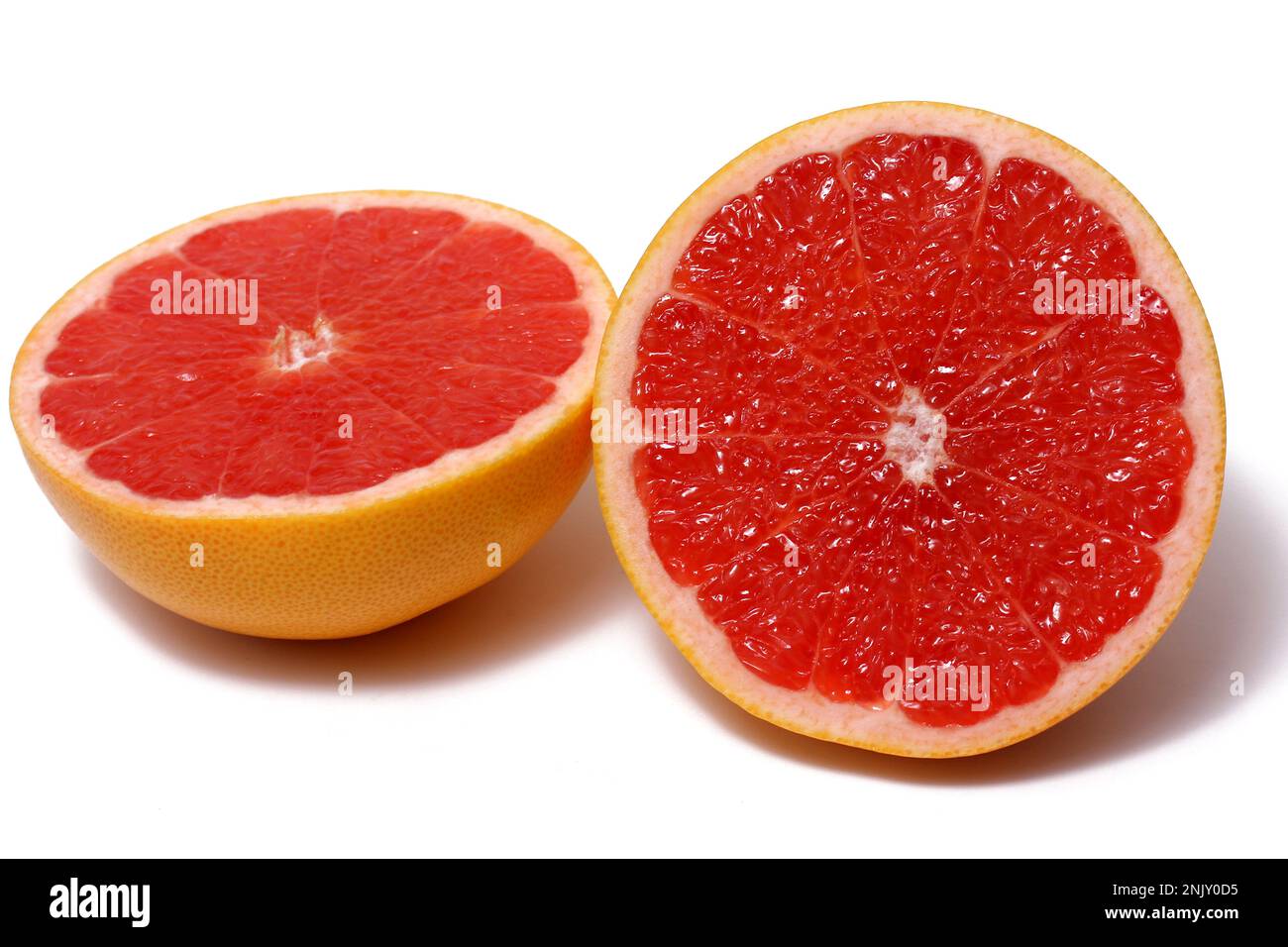 grapefruit (Citrus paradisi), halved grapefruit with red fruit pulp