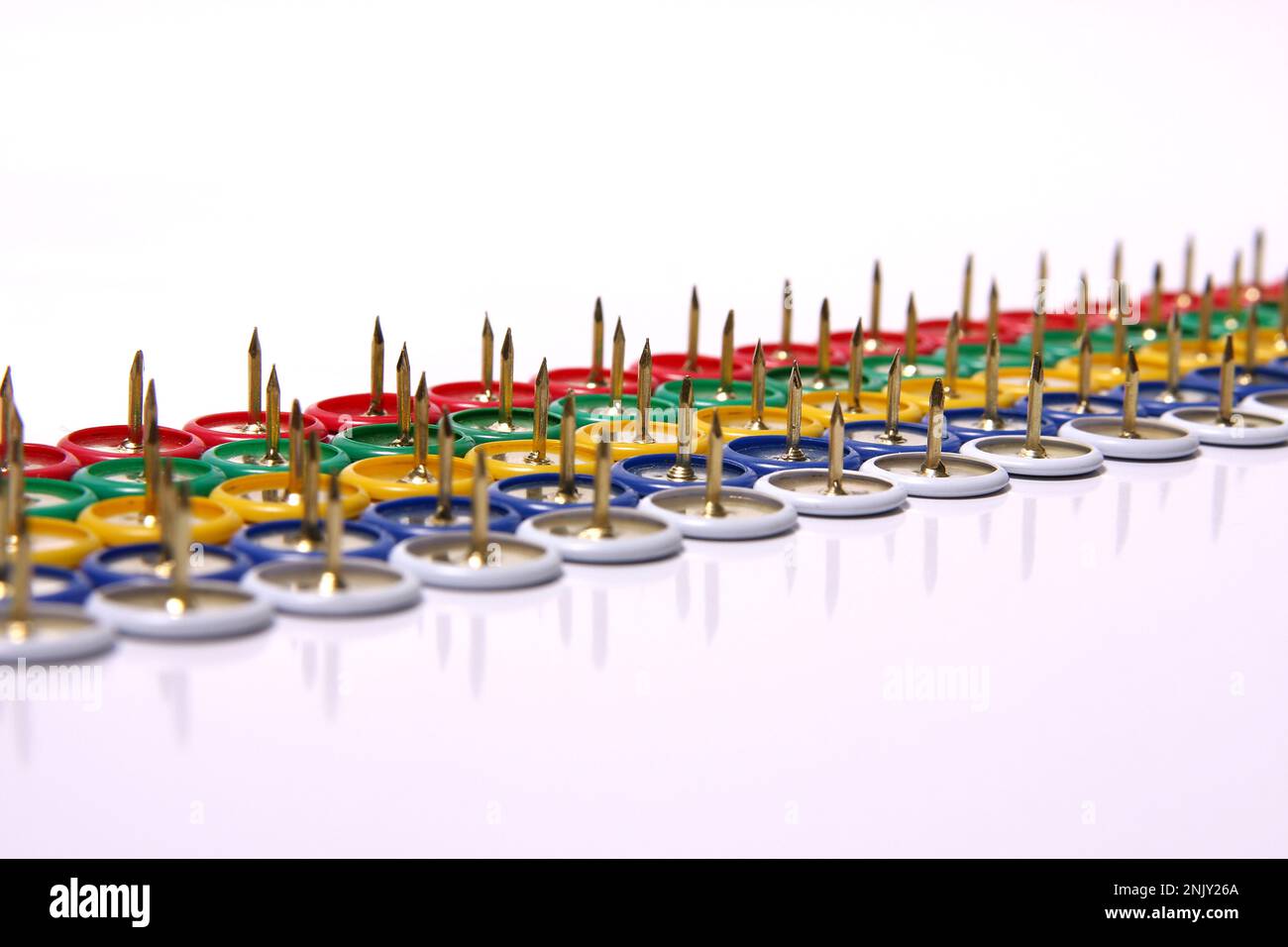 colourful tacks, in rows cutout Stock Photo Alamy