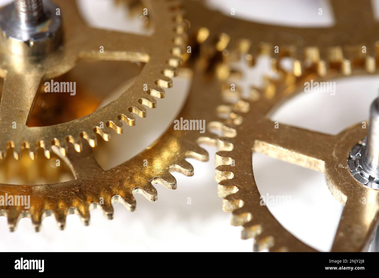 toothed wheels of a clockwork, cutout Stock Photo Alamy