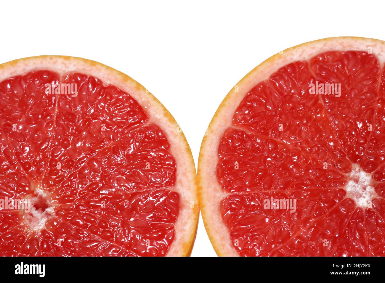 grapefruit (Citrus paradisi), halved grapefruit with red fruit pulp