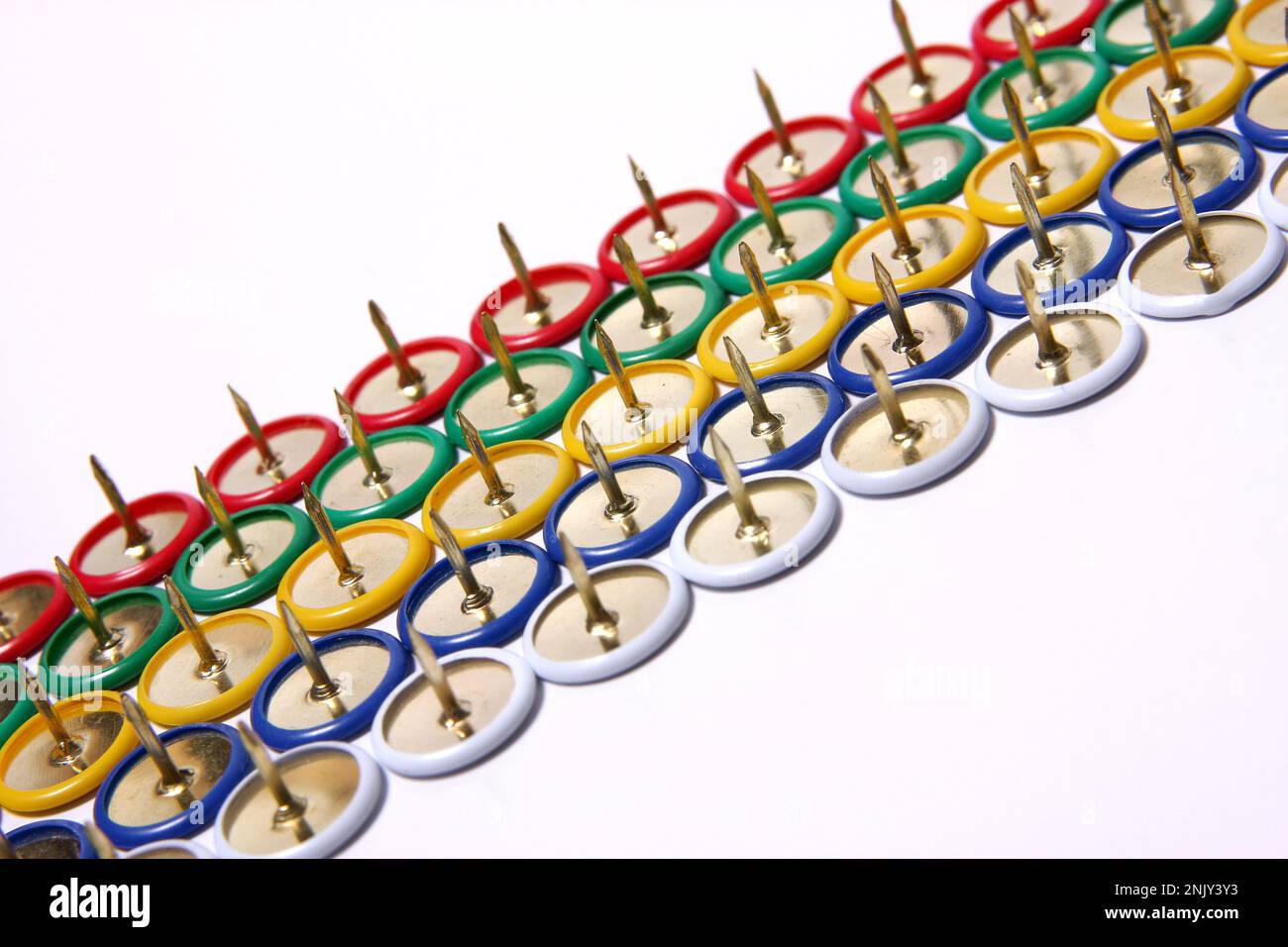 colourful tacks, in rows cutout Stock Photo Alamy