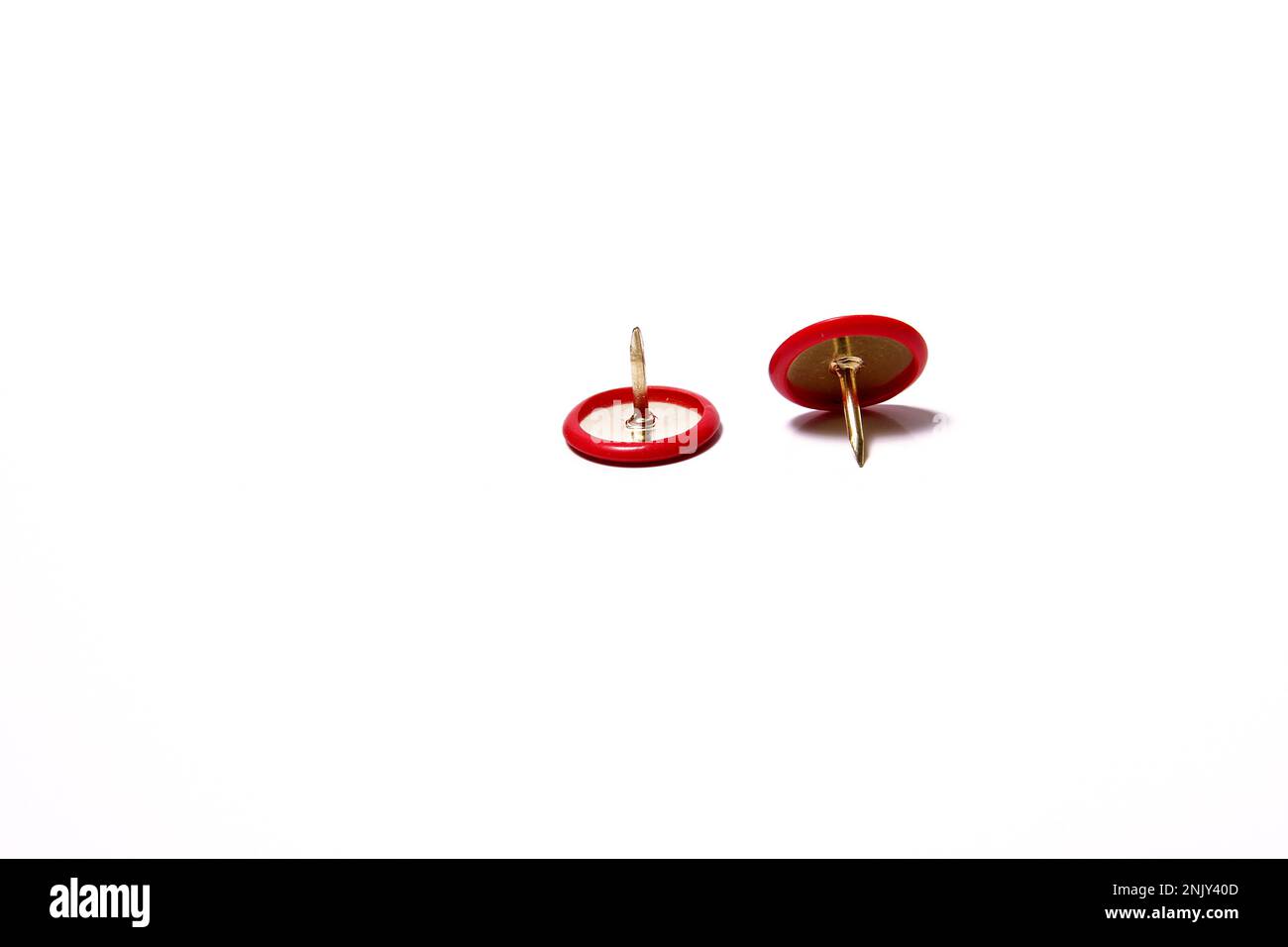 two red tacks, cutout Stock Photo Alamy