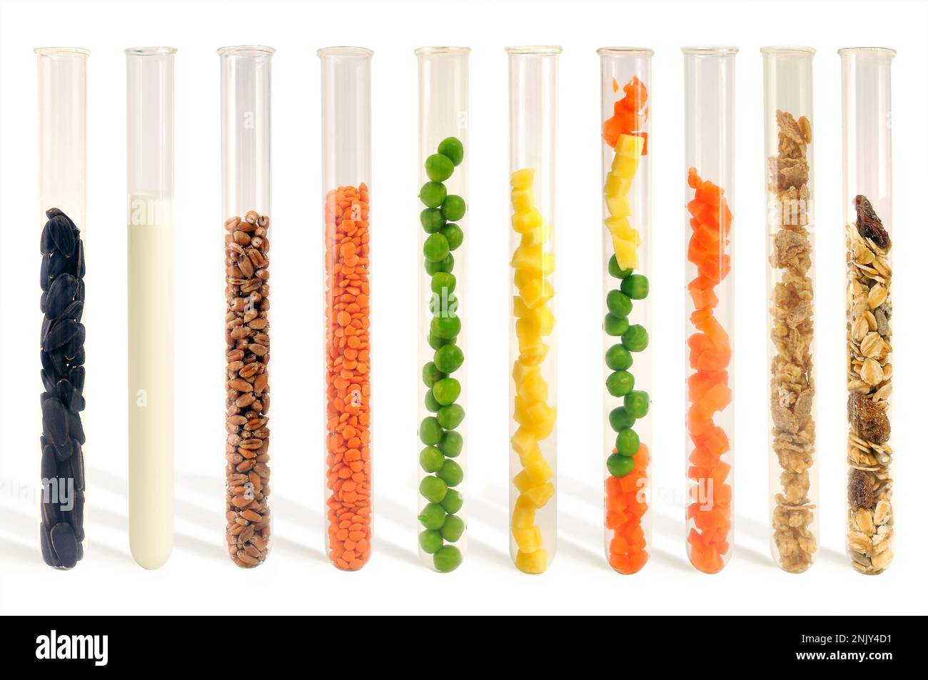 Vitamins, fibers and nutrients in a healthy natural organic food in a test tubes on a white