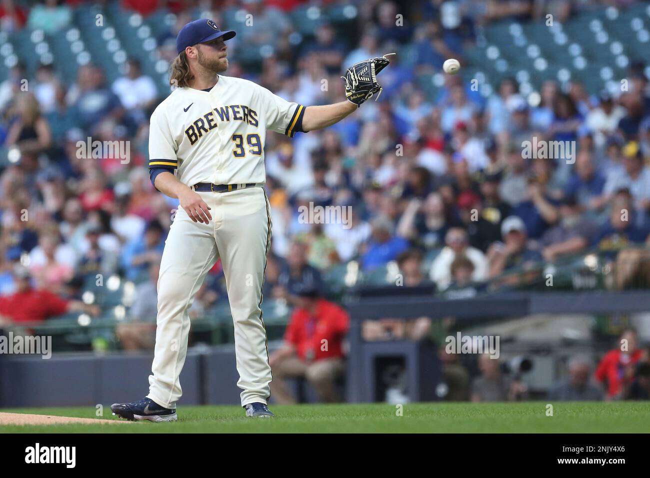 Milwaukee Brewers' Corbin Burnes thorws during a spring training baseball  workout Thursday, Feb. 16, 2023, in Phoenix. (AP Photo/Morry Gash Stock  Photo - Alamy