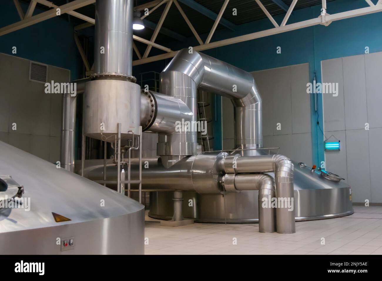 Steel pipes and tank for wort boiling at beer factory brewery equipment Stock Photo Alamy