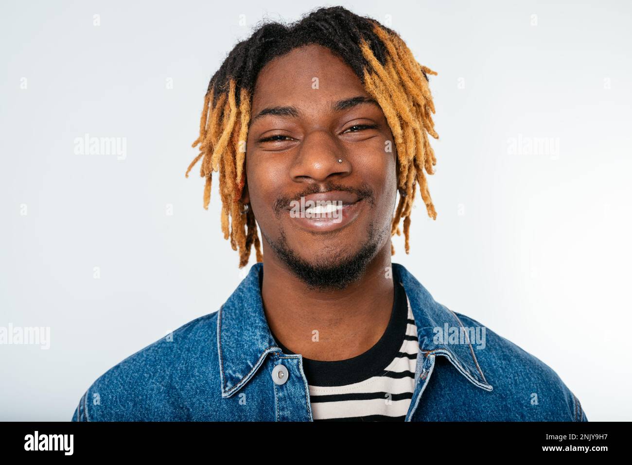 Young man dreadlocks black hat hi-res stock photography and images - Alamy