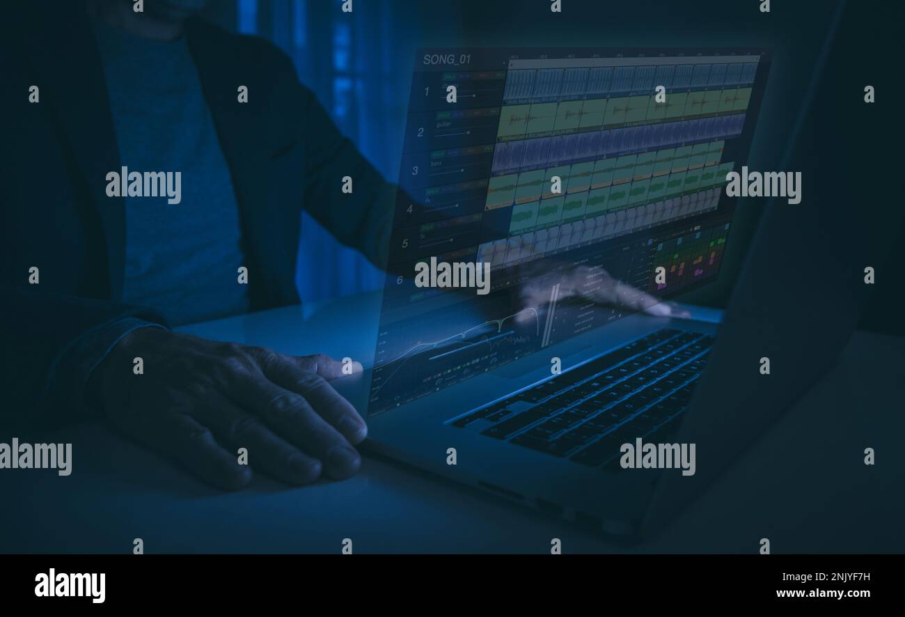 Male edits and cuts footage and sounds on laptop. Music producer work on home studio. Sound