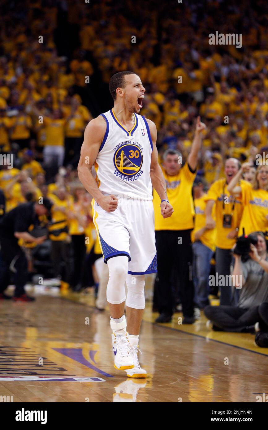 Davidson's Stephen Curry celebrates after a shot in the second