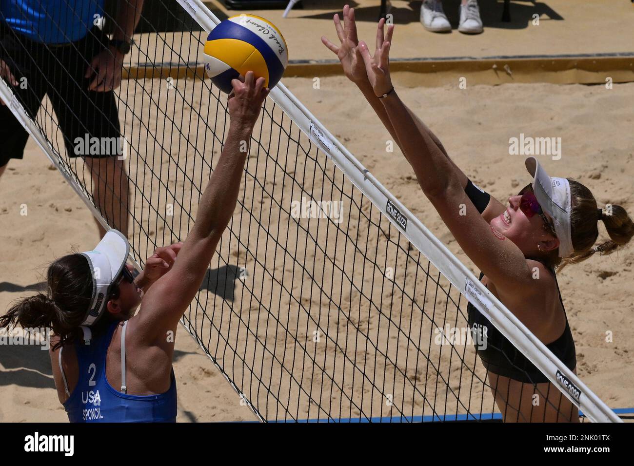 United States Sarah Sponcil, left, and teammate Terese Cannon react after winning a point during their match against Cuba at the Beach Volleyball World Championships in Rome, Friday, June 10, 2022