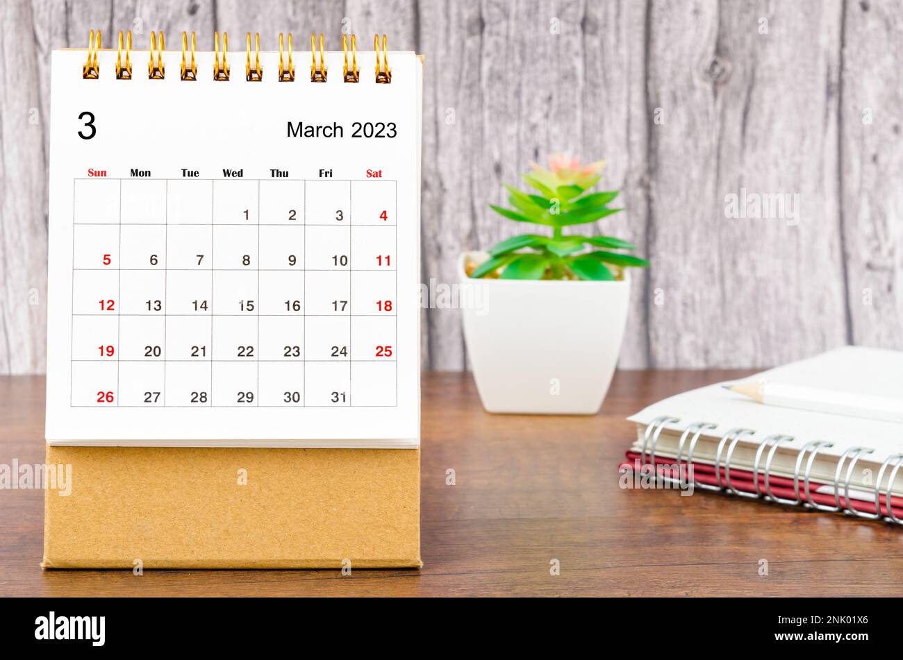 March 2023 Monthly desk calendar for 2023 year with pencil and diary