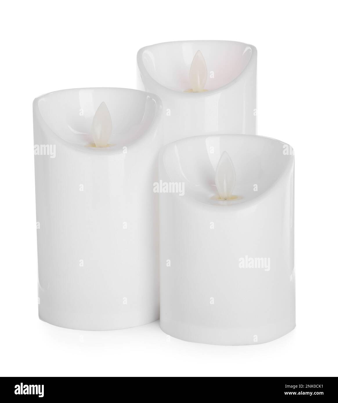 Decorative flameless LED candles on white background Stock Photo Alamy