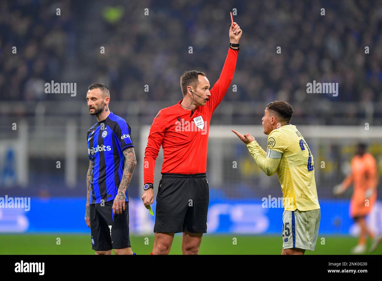 Milano, Italy. 22nd Feb, 2023. Referee Srdjan Jovanovic hands out a red
