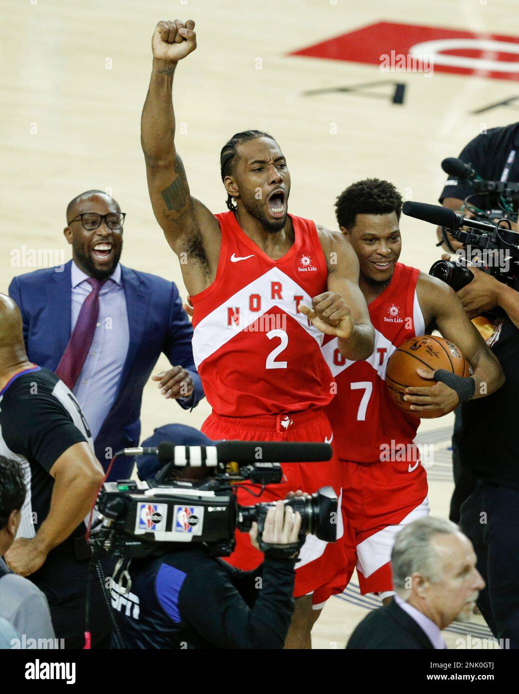 Toronto Raptors' Kawhi Leonard and Kyle Lowry react after winning game 6 of  the NBA Finals between the Golden State Warriors and the Toronto Raptors to  become the NBA champions at Oracle