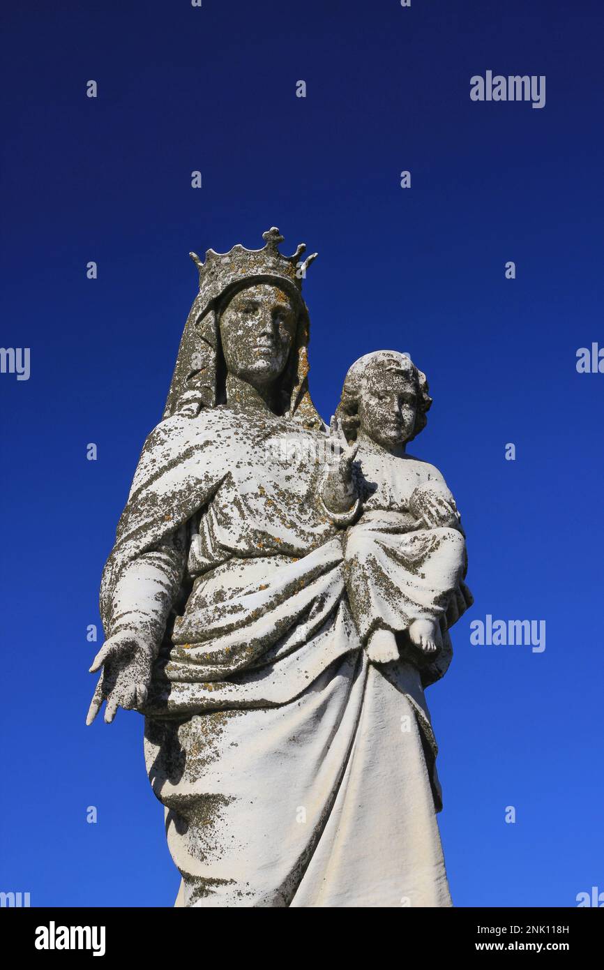 A crowned Vi4]rgin Mary holding her young son, Jesus Christ Stock Photo ...