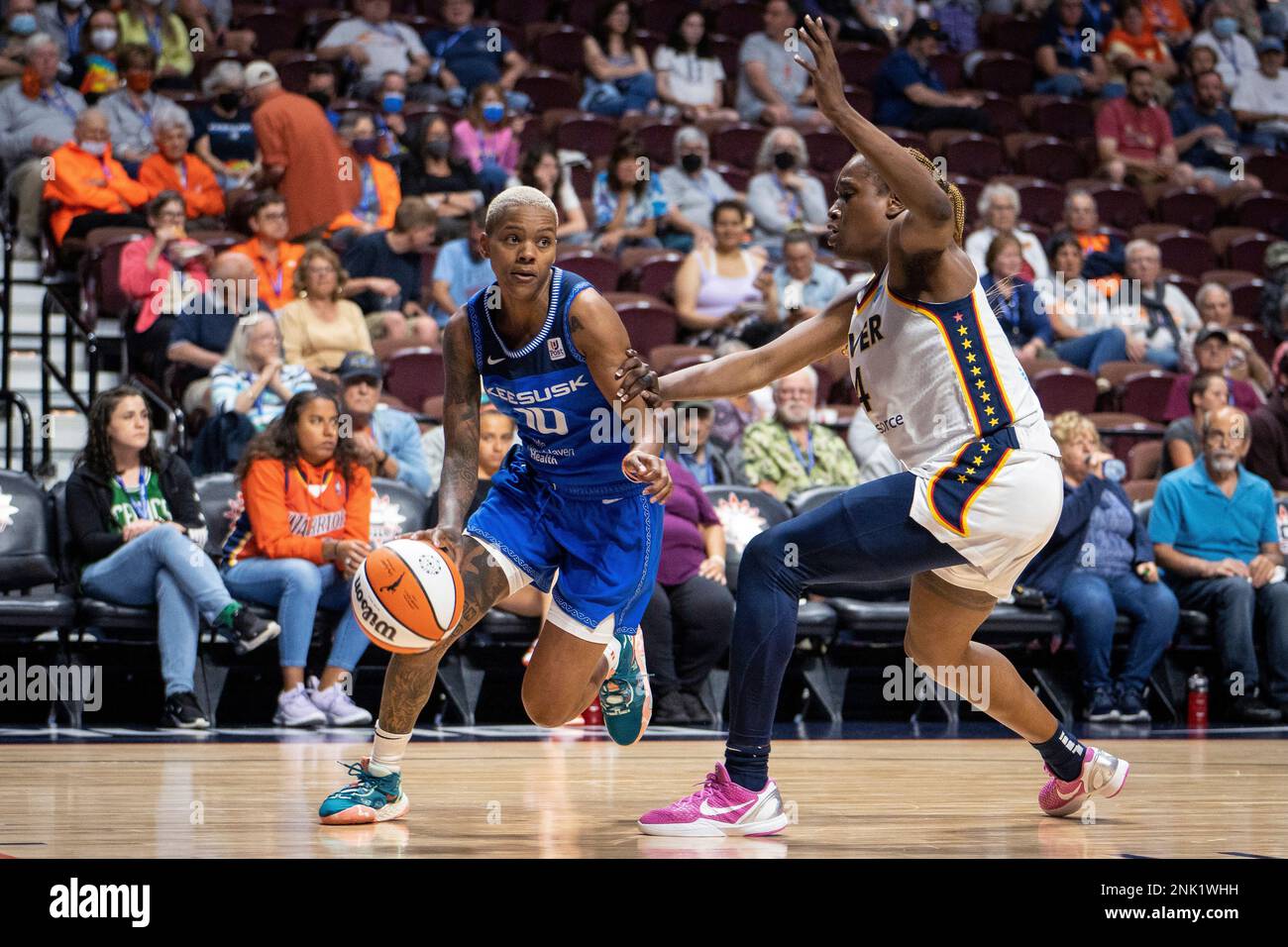 Connecticut Sun guard Courtney Williams (10) pushes through the defense