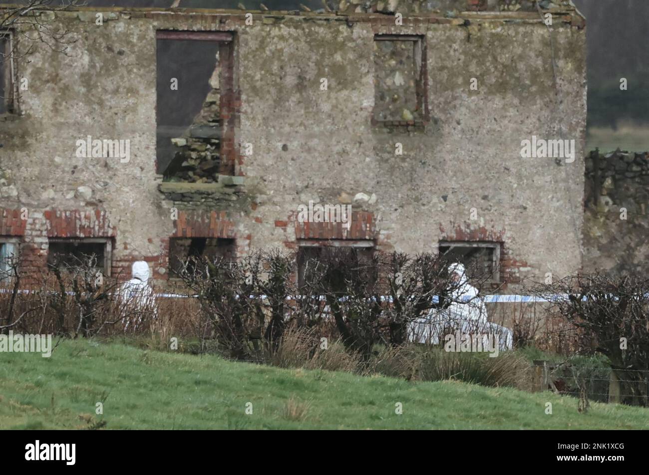 Forensice officers at property in Drumnakilly, where a vehicle was