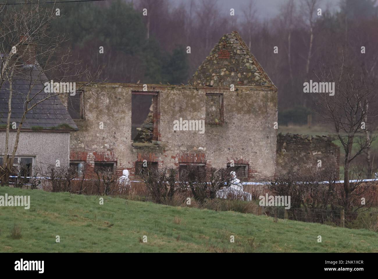 Forensice officers at property in Drumnakilly, where a vehicle was