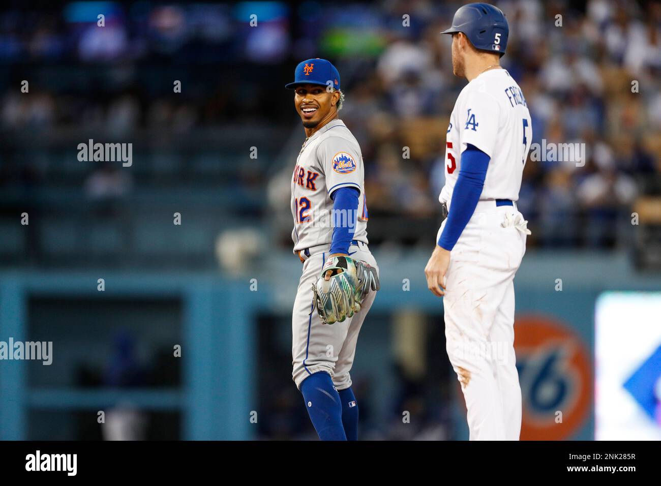 LOS ANGELES, CA - JUNE 03: New York Mets shortstop Francisco Lindor (12)  smiles at Los Angeles Dodgers first baseman Freddie Freeman (5) during a  regular season game between the New York