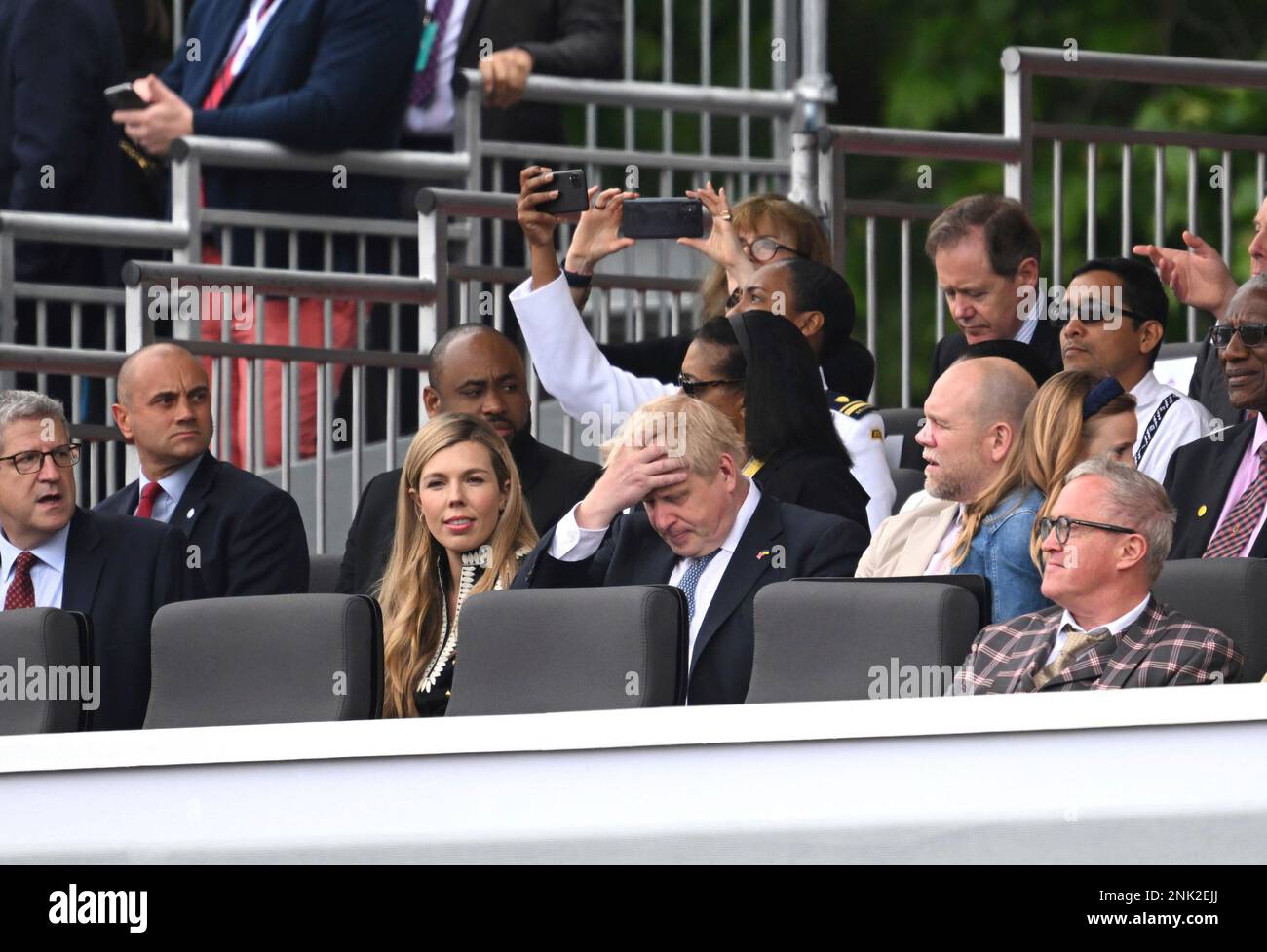 Britain's Prime Minister Boris Johnson and his wife Carrie, are seated