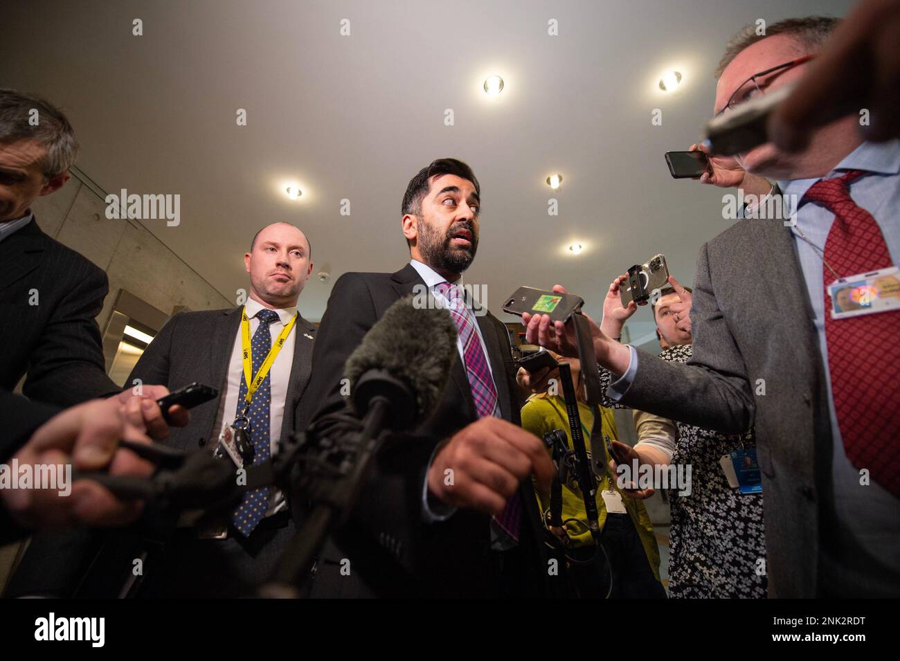 Edinburgh, Scotland, UK. 23rd Feb, 2023. PICTURED: Humza Yousaf MSP, Scottish Cabinet Health Minister, seen interviewed by waiting media after she announced she was stepping down along with the new SNP leadership bids. Credit: Colin D Fisher Credit: Colin Fisher/Alamy Live News Stock Photo