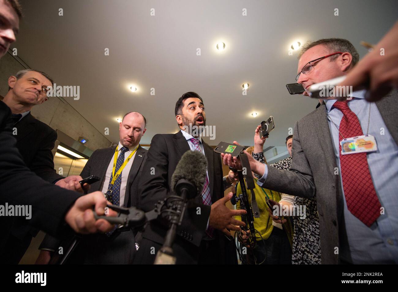 Edinburgh, Scotland, UK. 23rd Feb, 2023. PICTURED: Humza Yousaf MSP, Scottish Cabinet Health Minister, seen interviewed by waiting media after she announced she was stepping down along with the new SNP leadership bids. Credit: Colin D Fisher Credit: Colin Fisher/Alamy Live News Stock Photo