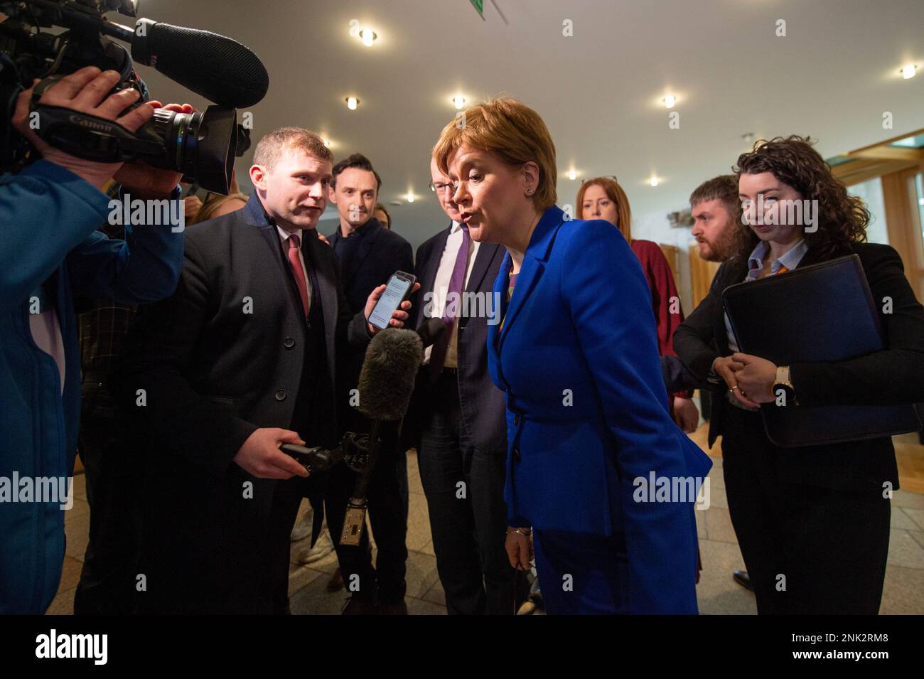 Edinburgh, Scotland, UK. 23rd Feb, 2023. PICTURED: Nicola Sturgeon, First Minister of Scotland seen interviewed by waiting media after she announced she was stepping down along with the new SNP leadership bids. Credit: Colin D Fisher Credit: Colin Fisher/Alamy Live News Stock Photo