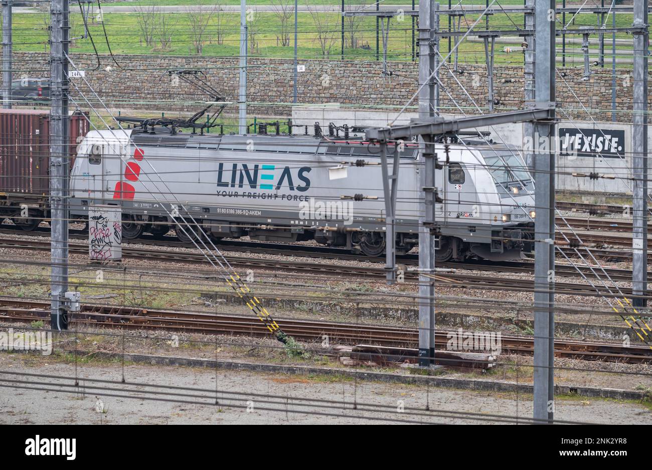 Leuven, Flemish Brabant, Belgium - Feb 11 2023 - Fright train of Lineas waiting at the tracks near the station Stock Photo