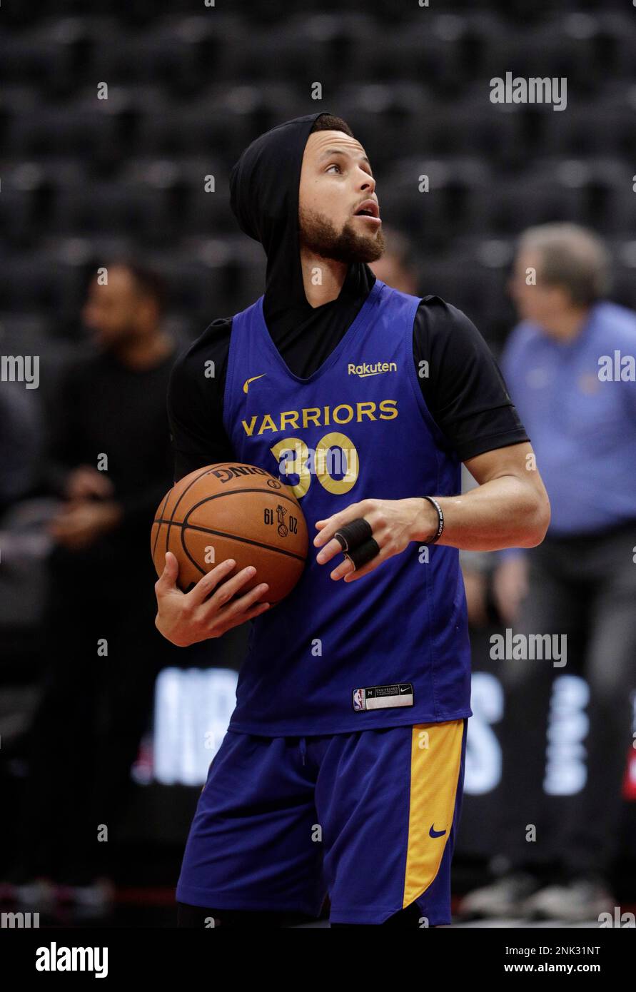 Stephen Curry (30) looks over his shoulder as the Golden State Warriors and  Toronto Raptors practiced during an off day between Games 1 and 2 of the  2019 NBA Finals at Scotiabank