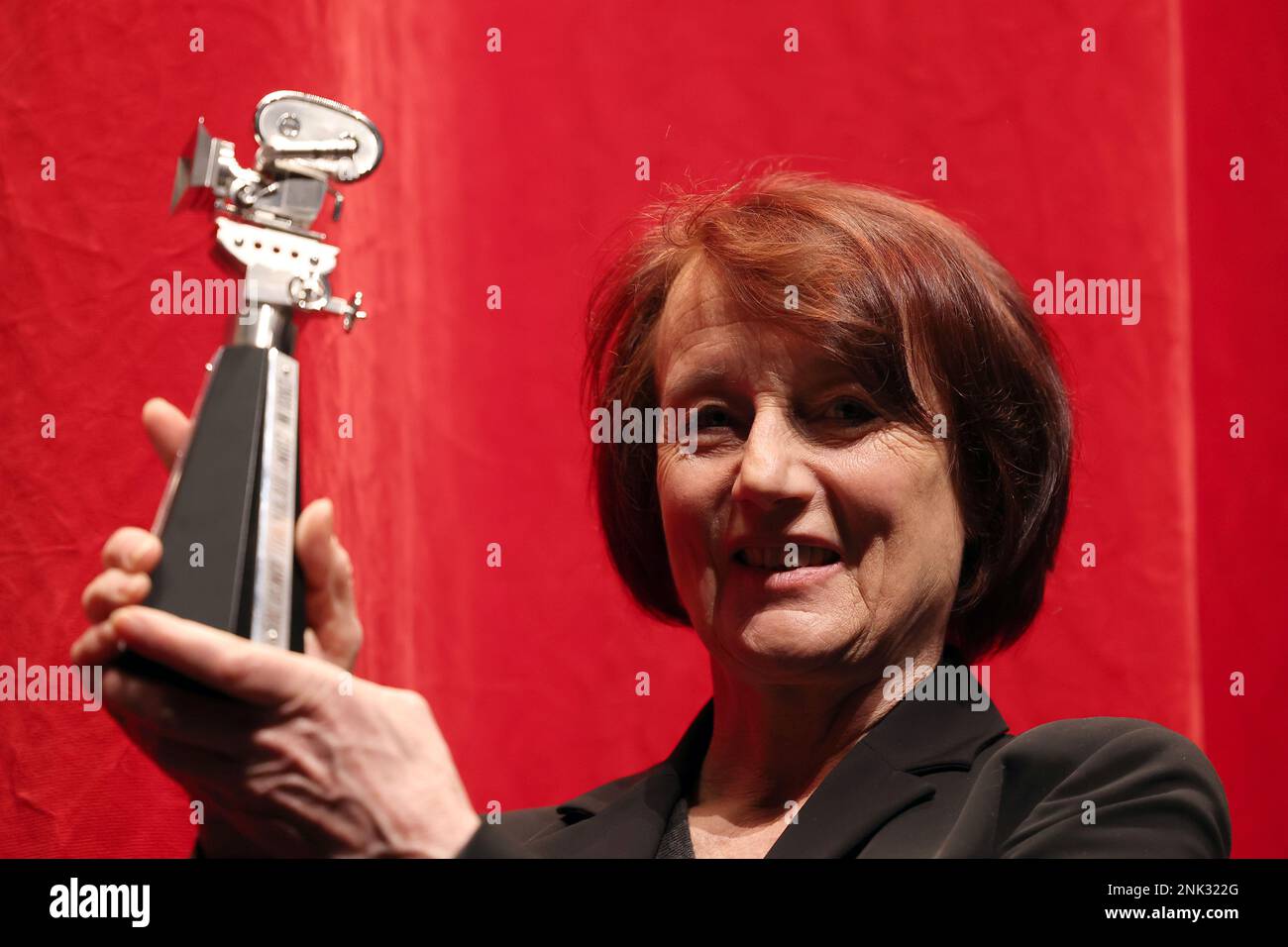 Berlin, Germany. 23rd Feb, 2023. French cinematographer Caroline Champetier receives the Berlinale Camera at the Haus der Berliner Festspiele. With the Berlinale Camera, the Berlinale honors personalities and institutions that have rendered outstanding services to filmmaking. The 73rd International Film Festival will take place in Berlin from Feb. 16 - 26, 2023. Credit: Gerald Matzka/dpa/Alamy Live News Stock Photo
