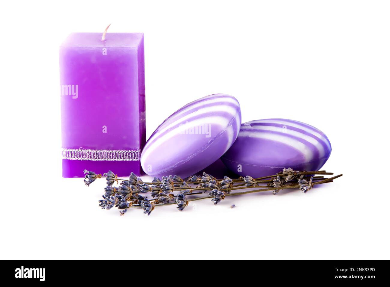 Soap, scented candle and dry lavender flowers isolated on white
