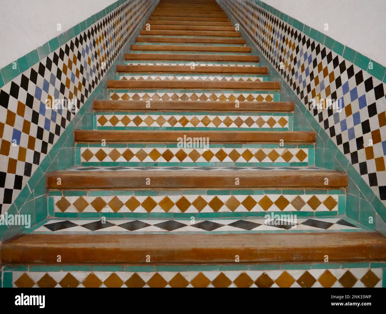Staircase Eclectic Miami beige tiles blue tiles brick patio bright tile stairs colorful stairs floral tiles g…