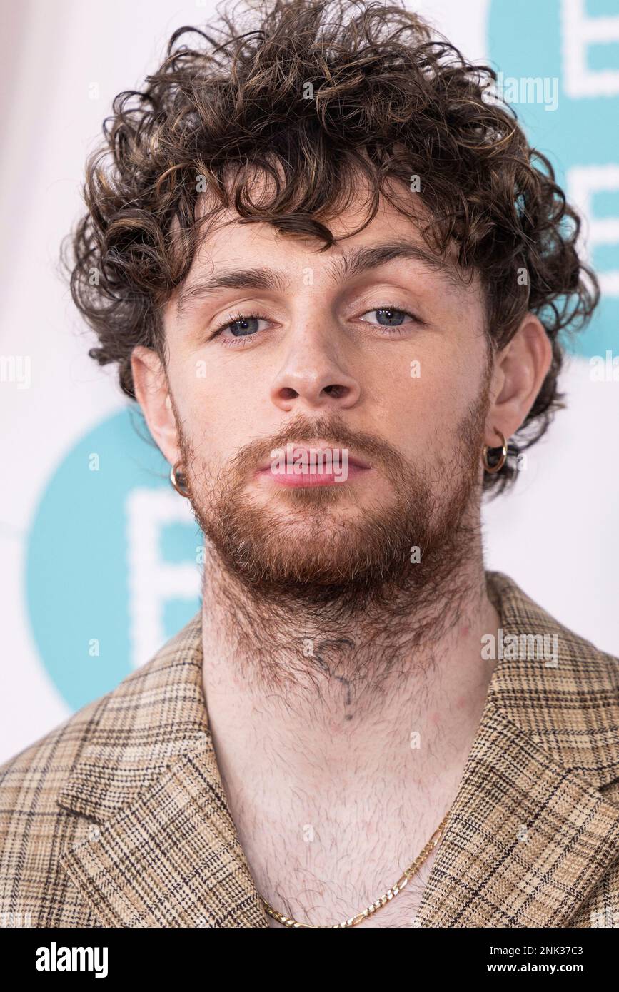 Tom Grennan poses for photographers upon arrival at the 76th British