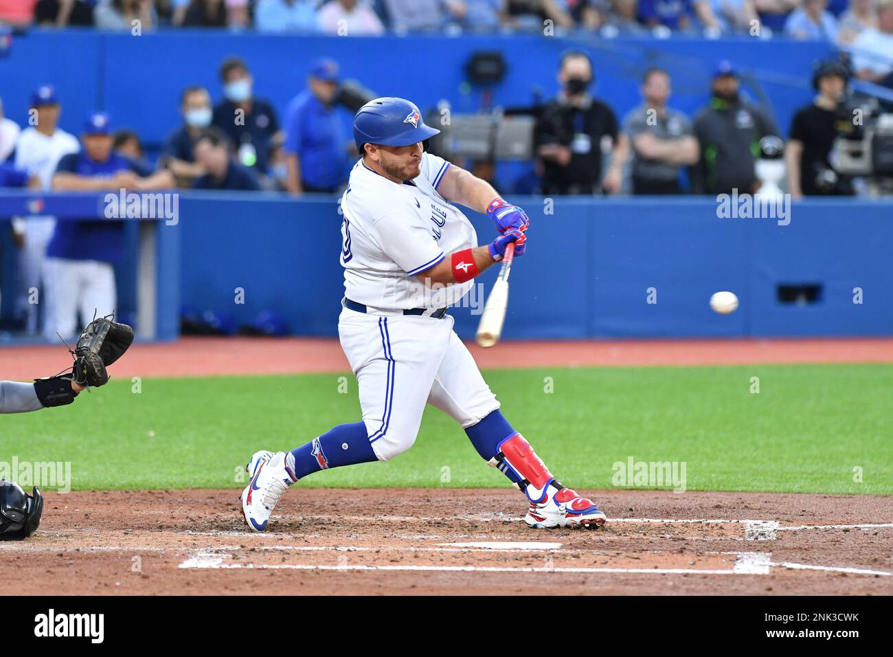 TORONTO, ON - MAY 31: Toronto Blue Jays catcher Alejandro Kirk (30) hits  line drive towards third base during the MLB regular season game between  the Chicago White Socks and the Toronto