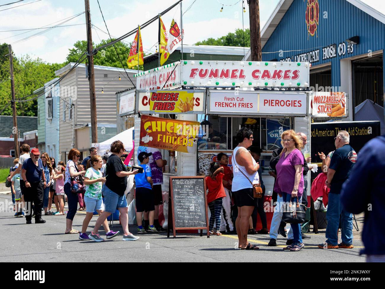 People fill the street at the Food Truck and Arts Festival on East