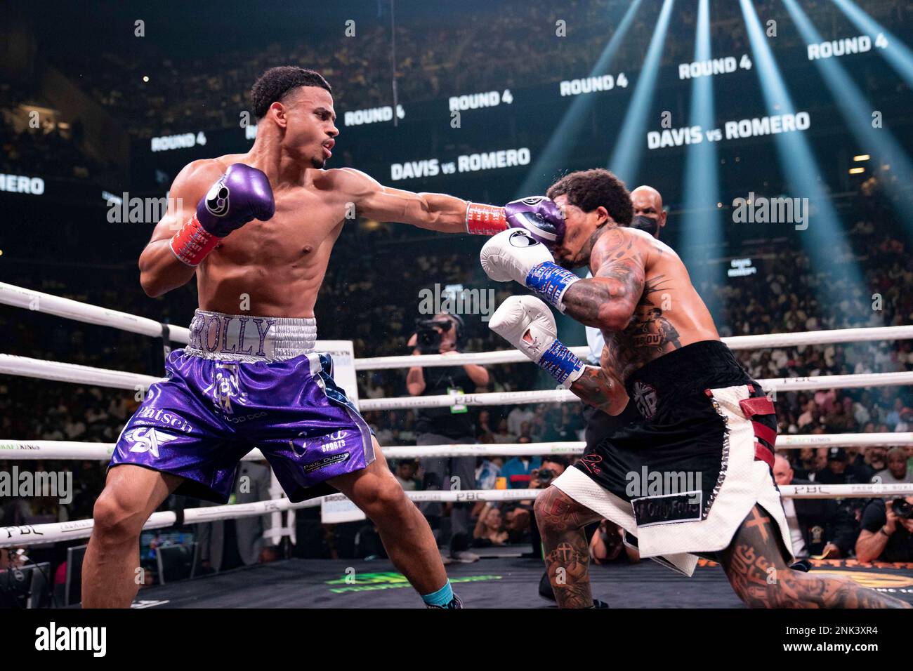 May 29, 2022, Brooklyn, New York, USA GERVONTA DAVIS (black and white trunks) battles ROLANDO ROMERO in a WBA Lightweight Championship bout at the Barclays Center in Brooklyn, New York
