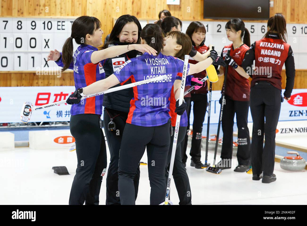 Members of Loco Solare react after winning the Japan National Curling Championships at Advics Tokoro Curling Hall in Kitami, Hokkaido on May 29, 2022