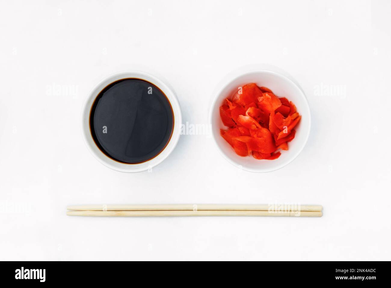 Funny face image of emoticon from soy sauce, pickled ginger and