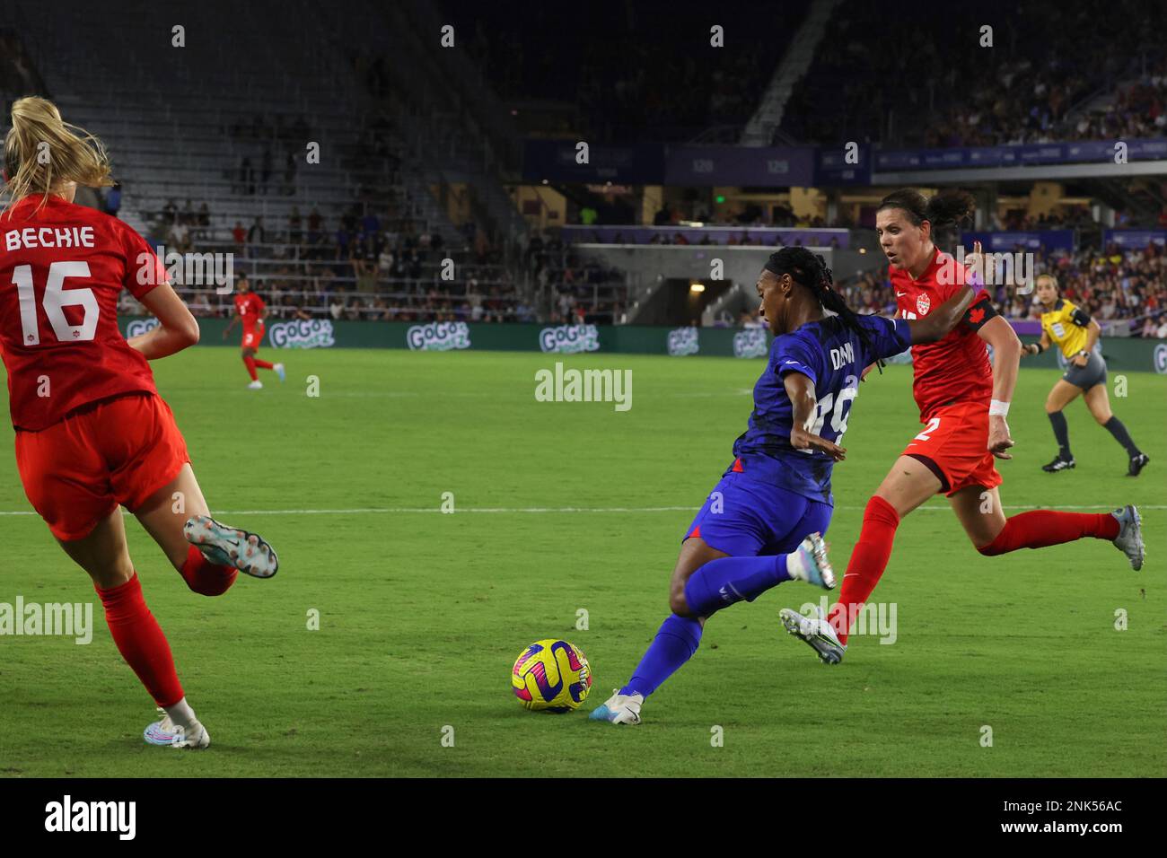 United States Women’s National Team defender Crystal Dunn (19) clears the ball as Canada Women’s National Team midFielder Christine Sinclair (12) approaches at Exploria Stadium on February 16, 2023 in Orlando, FL.  United States defeated Canada 2-0 in the 2023 SheBelieves Cup match (Credit: Paul Fong/Image of Sport) Stock Photo