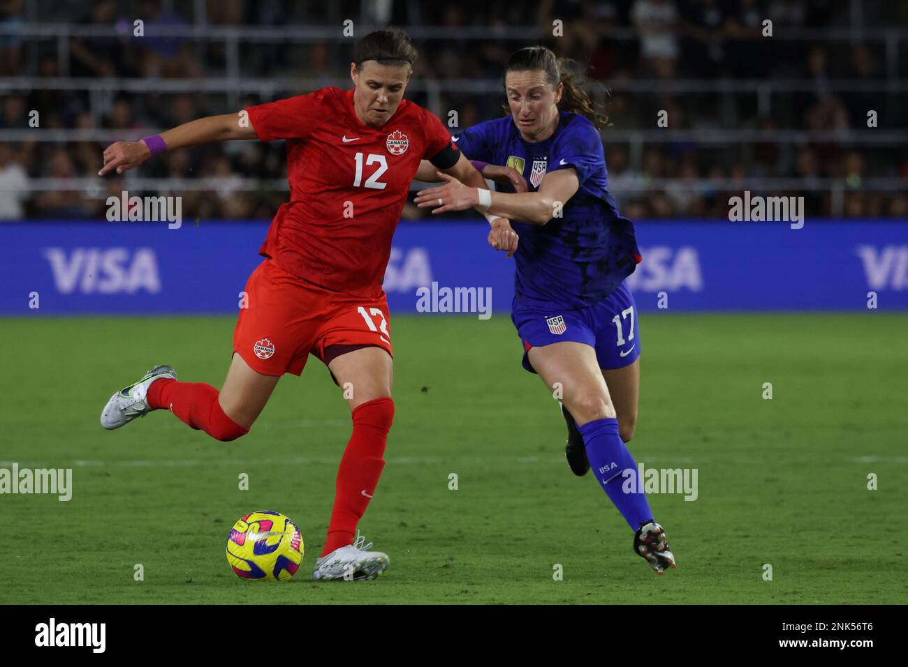 Canada Women’s National Team midFielder Christine Sinclair (12) tries to dribble past United States Women’s National Team midFielder Andi Sullivan (17) at Exploria Stadium on February 16, 2023 in Orlando, FL.  United States defeated Canada 2-0 in the 2023 SheBelieves Cup match (Credit: Paul Fong/Image of Sport) Stock Photo