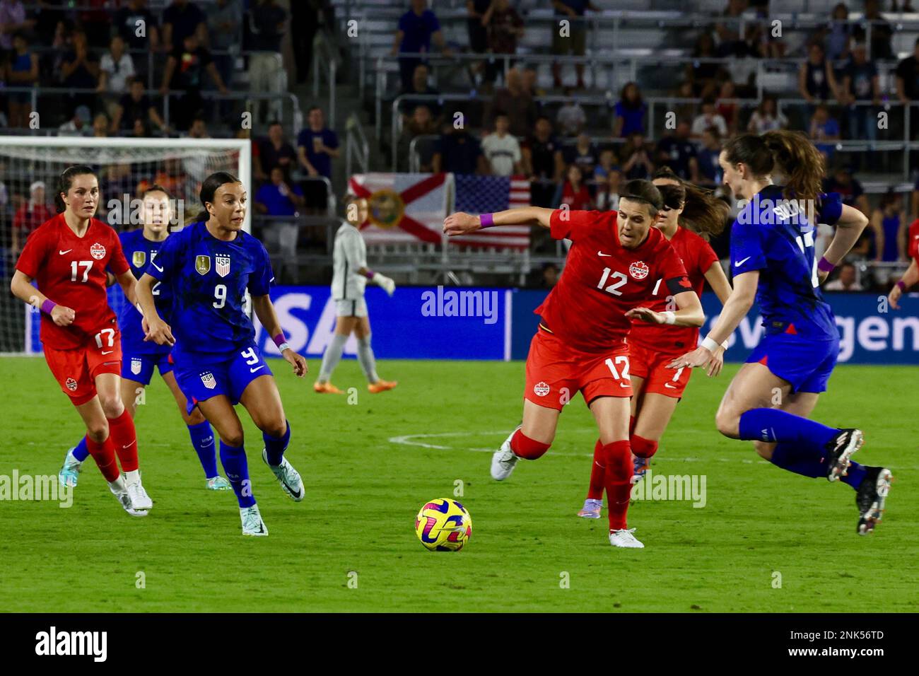 Canada Women’s National Team midFielder Christine Sinclair (12) tries to dribble around United States Women’s National Team midFielder Andi Sullivan (17) at Exploria Stadium on February 16, 2023 in Orlando, FL.  United States defeated Canada 2-0 in the 2023 SheBelieves Cup match (Credit: Paul Fong/Image of Sport) Stock Photo