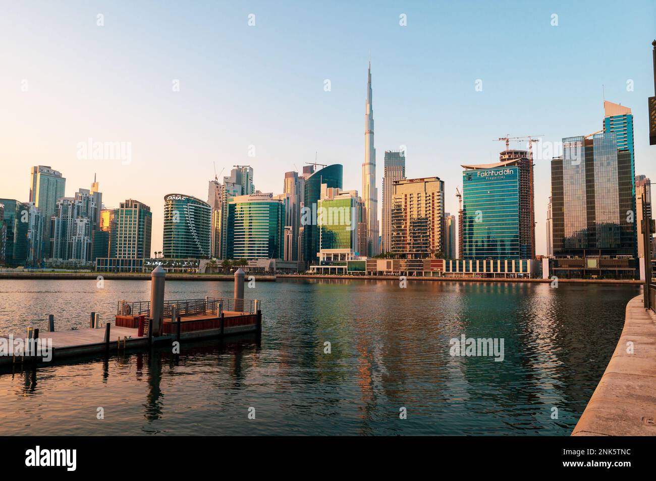 Dubai, United Arab Emirates - September 10, 2022: Dubai Skyline of a bustling downtown city seen from the Business bay area, surrounded by skyscrapers Stock Photo