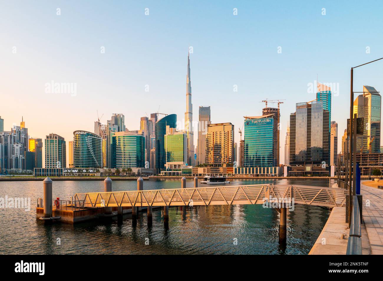 Dubai, United Arab Emirates - September 10, 2022: Dubai Skyline of a bustling downtown city seen from the Business bay area, surrounded by skyscrapers Stock Photo