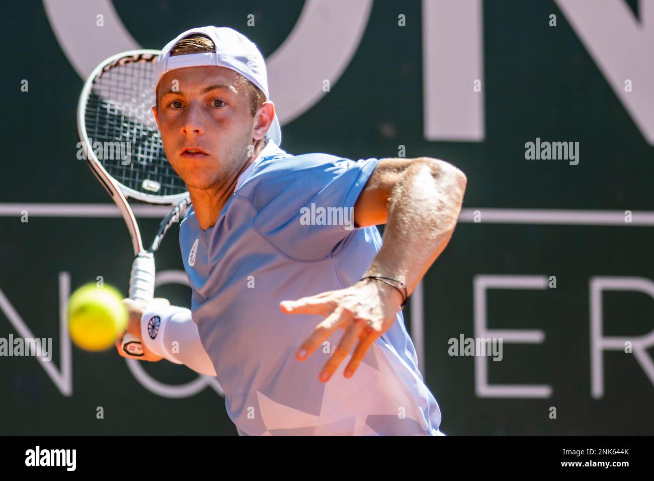 Tallon Griekspoor of Netherlands, returns a ball to Johan Nikles, of Switzerland, during their second round match, at the ATP 250 Geneva Open tournament in Geneva, Switzerland, Wednesday, May 18, 2022